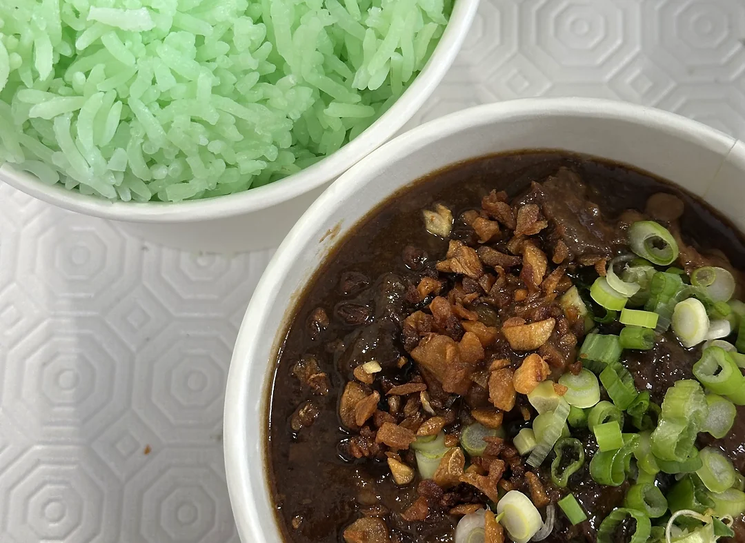 Beef pares with fried garlic and scallions, served with pandan rice